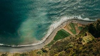 Aerial drone view of Camara de Lobos village, Madeira.