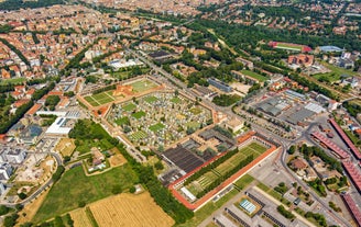 Photo of panorama of Parma cathedral with Baptistery leaning tower on the central square in Parma town in Italy.