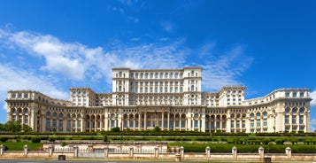 Antique building view in Old Town Bucharest city - capital of Romania and Dambrovita river. Bucharest, Romania, Europe.