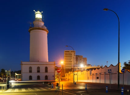 Photo of Lighthouse at Malaga in evening. Spain .