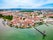 Photo of aerial panoramic view of Friedrichshafen that is a city on the shore of Lake Constance or Bodensee in Bavaria, Germany.