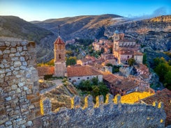 photo of summer view of Teruel with landmarks (Cathedral of Santa María de Mediavilla, Mausoleum of the Amantes) in Aragon, Spain.