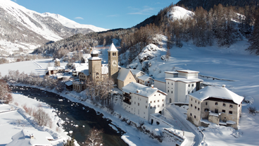 Photo of  beautiful Scuol town in Swiss Alps and Inn river, Switzerland.