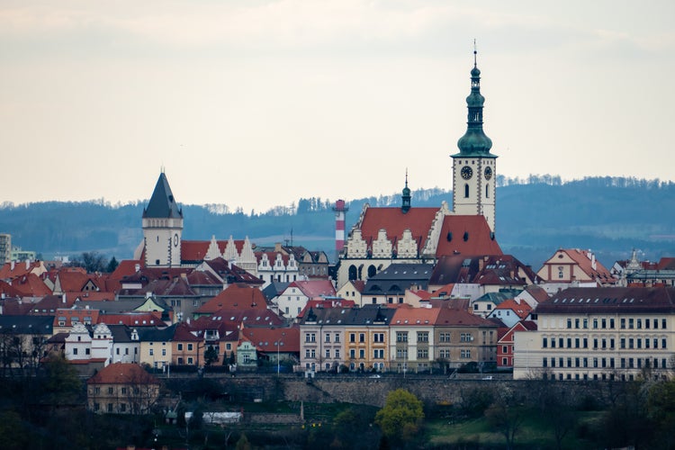 photo of view of View of the European old town Tábor, Czechia. Towers of church and town-hall. View from the lookout tower. Centred on the downtown. Bright