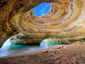 Photo of Carvoeiro fishing village with beautiful beach and colourful houses, Portugal.