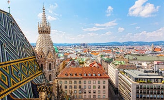 Panoramic view of historic Zurich city center with famous Fraumunster, Grossmunster and St. Peter and river Limmat at Lake Zurich on a sunny day with clouds in summer, Canton of Zurich, Switzerland