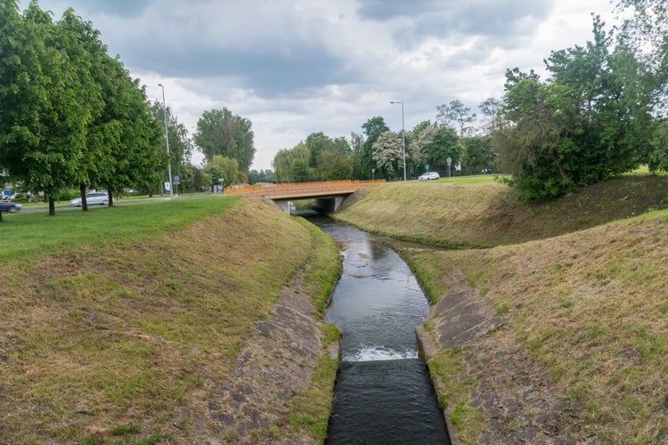 photo of view of Small river Baczyna in Lubin, Poland.