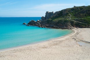 Photo of scenic aerial view over the town of Santa Teresa Gallura, located on the northern tip of Sardinia, on the Strait of Bonifacio, Italy.