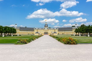 Photo of aerial panoramic view of Hohes Schloss Fussen or Gothic High Castle of the Bishops and St. Mang Abbey monastery in Fussen, Germany.