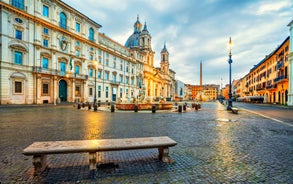 Aerial panoramic cityscape of Rome, Italy, Europe. Roma is the capital of Italy. Cityscape of Rome in summer. Rome roofs view with ancient architecture in Italy. 