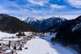 Photo of loisach river flowing through garmisch-partenkirchen, idyllic winter landscape bavaria.