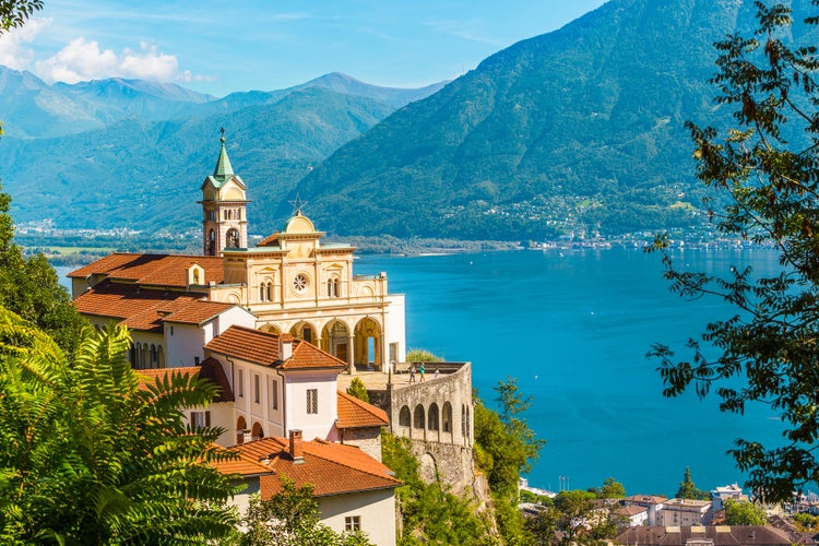 Photo of Madonna del Sasso Church above Locarno city and the Maggiore lake in Ticino, Switzerland.