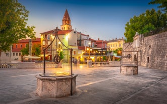 Photo of aerial view of town of Labin with old traditional houses and castle in Istria, Croatia.