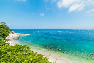 Photo of aerial view of Capri island in a beautiful summer day in Italy.