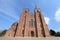 Photo of the entrance of Roskilde Cathedral, church of the Danish royal family in Denmark.