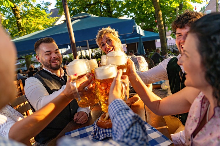 merry people drinking beer oktoberfest.jpg