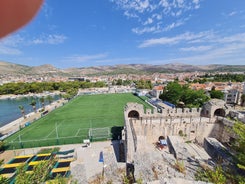 photo of a beautiful panoramic view of Kastel Luksic harbor and landmarks summer view, Split region of Dalmatia, Croatia.