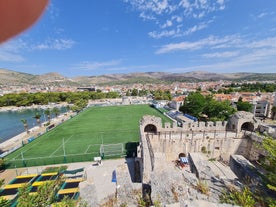 Photo of aerial view of Stobrec popular touristic destination on Adriatic sea, suburb of city of Split, Croatia.