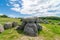 Photo of Poskær Stenhus (Postkaer Stenhus) near the village of Knebel in Djursland is the largest round barrow in Denmark.