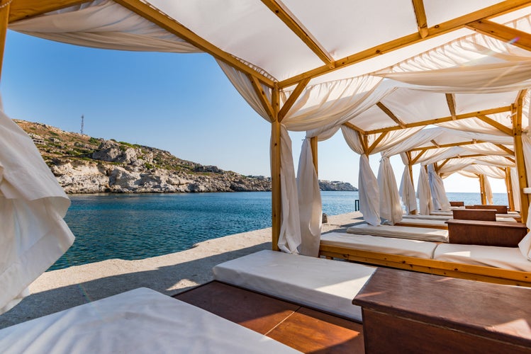 Photo of luxury and relaxing place at Kalithea Spring Beach, Rhodes, Greece. 