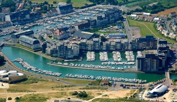 Photo of aerial view of the long sandy beach of Sword beach in Hermanville-sur-Mer towards Ouistreham ,France.