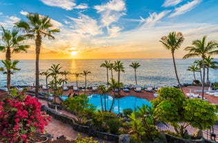 photo of aerial view of the beach and lagoon of Los Cristianos resort on Tenerife, Canary Islands, Spain.