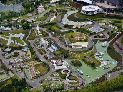 BRUSSELS, BELGIUM - Panoramic view from the observation deck on the top level of the Atomium - the green trees, modern and historic buildings, and miniature Park "Mini Europe",