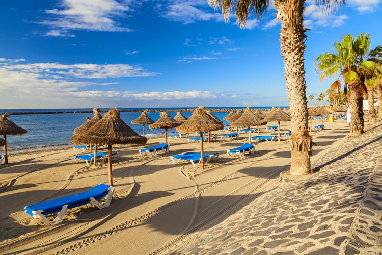 Photo of Los Cristianos beautiful beach in the island of Tenerife, Canary Islands, Spain.