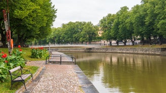 Early autumn morning panorama of the Port of Turku, Finland, with Turku Castle at background.