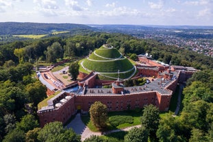 Photo of Lednice Chateau with beautiful gardens and parks on a sunny summer day, Czech Republic.