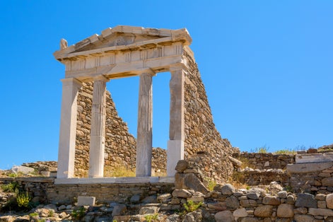 photo of view ofThe Temple of Isis in Archaeological Site of Delos island, Cyclades, Greece.,Mykonos Greece.