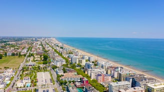 Photo of aerial view of Lido di Jesolo, or Jesolo Lido the beach area of the city of Jesolo in the province of Venice, Italy.