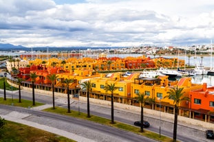 Photo of aerial view of touristic Portimao with wide sandy Rocha beach, Algarve, Portugal.