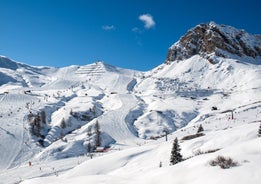 photo of the romantic, Snow covered Skiing Resort of Cortina d Ampezzo in the Italian Dolomites seen from Tofana with Col Druscie in the foreground.