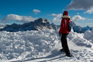 photo of the romantic, Snow covered Skiing Resort of Cortina d Ampezzo in the Italian Dolomites seen from Tofana with Col Druscie in the foreground.