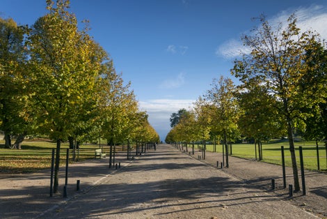 Photo of Kaivopuisto city urban park in Helsinki Finland on sunny day.
