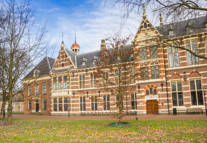 photo of yellow and purple crocuses in front of the Drents Museum in Assen, Netherlands.