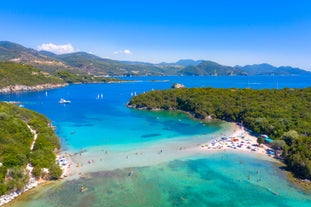 Photo of aerial view of Malia beach and small island with Church of Transfiguration, Heraklion, Crete, Greece.