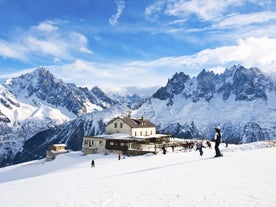 Photo of The winter view on the montains and ski lift station in French Alps near Chamonix Mont-Blanc.