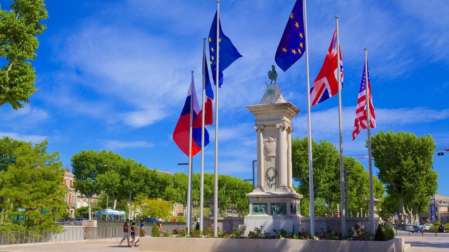 Memory Monument for soldiers killed in World Wars 1914-1918 and 1939-1941 Narbonne France among green trees