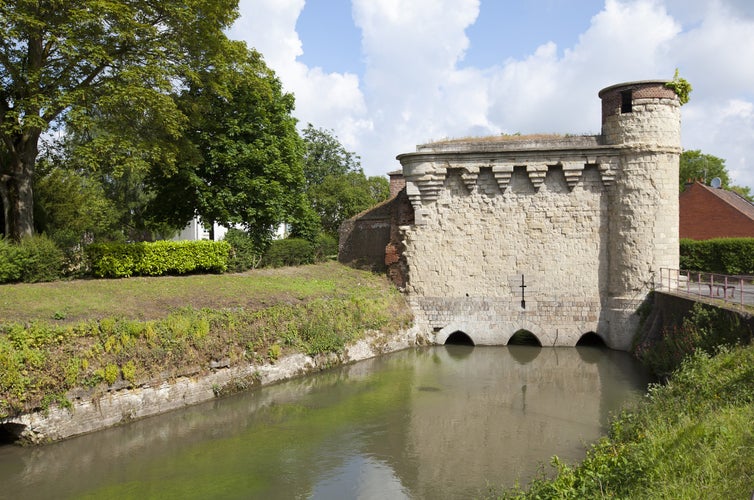 Cambrai, France. The water gate that allowed the river Escaut to flow through the walls and thus into the town. Built at the end of the 14th Century.