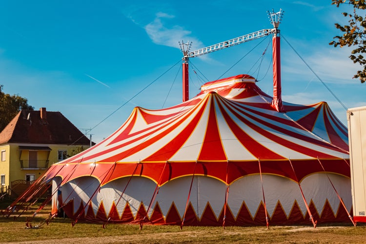 Photo of Autumn or indian summer view with a red and white circus tent near Wallerfing, Deggendorf, Bavaria, Germany