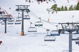 photo of Mountains in Androrra and ski cable car over the valley of Soldeu - Pas de la Casa.