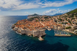 Photo of panoramic aerial view of the old town of Dubrovnik, Croatia seen from Bosanka viewpoint on the shores of the Adriatic Sea in the Mediterranean Sea.