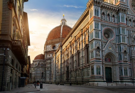 photo of Piazza del Duomo and cathedral of Santa Maria del Fiore in Florence, Italy .