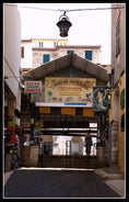 photo of harbor and town of Golfe-Juan Vallauris, commune of the Alpes-Maritimes department, which belongs in turn to the Provence-Alpes-Cote of Azur region of France.