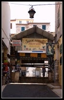 photo of harbor and town of Golfe-Juan Vallauris, commune of the Alpes-Maritimes department, which belongs in turn to the Provence-Alpes-Cote of Azur region of France.