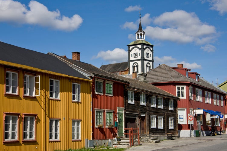 photo of view of Row of houses and church tower in Roros, Sor-Trondelag, Trondelag, Norway.