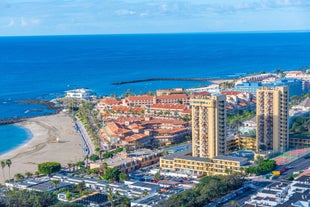 photo of aerial view of the beach and lagoon of Los Cristianos resort on Tenerife, Canary Islands, Spain.