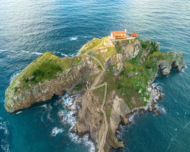 photo of aerial and drone view of San juan de Gaztelugatxe in Bermeo, Spain.